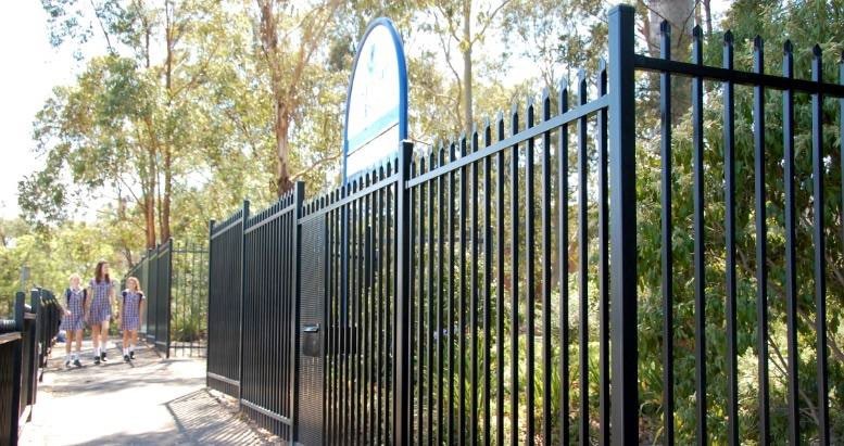A black  metal picket fence